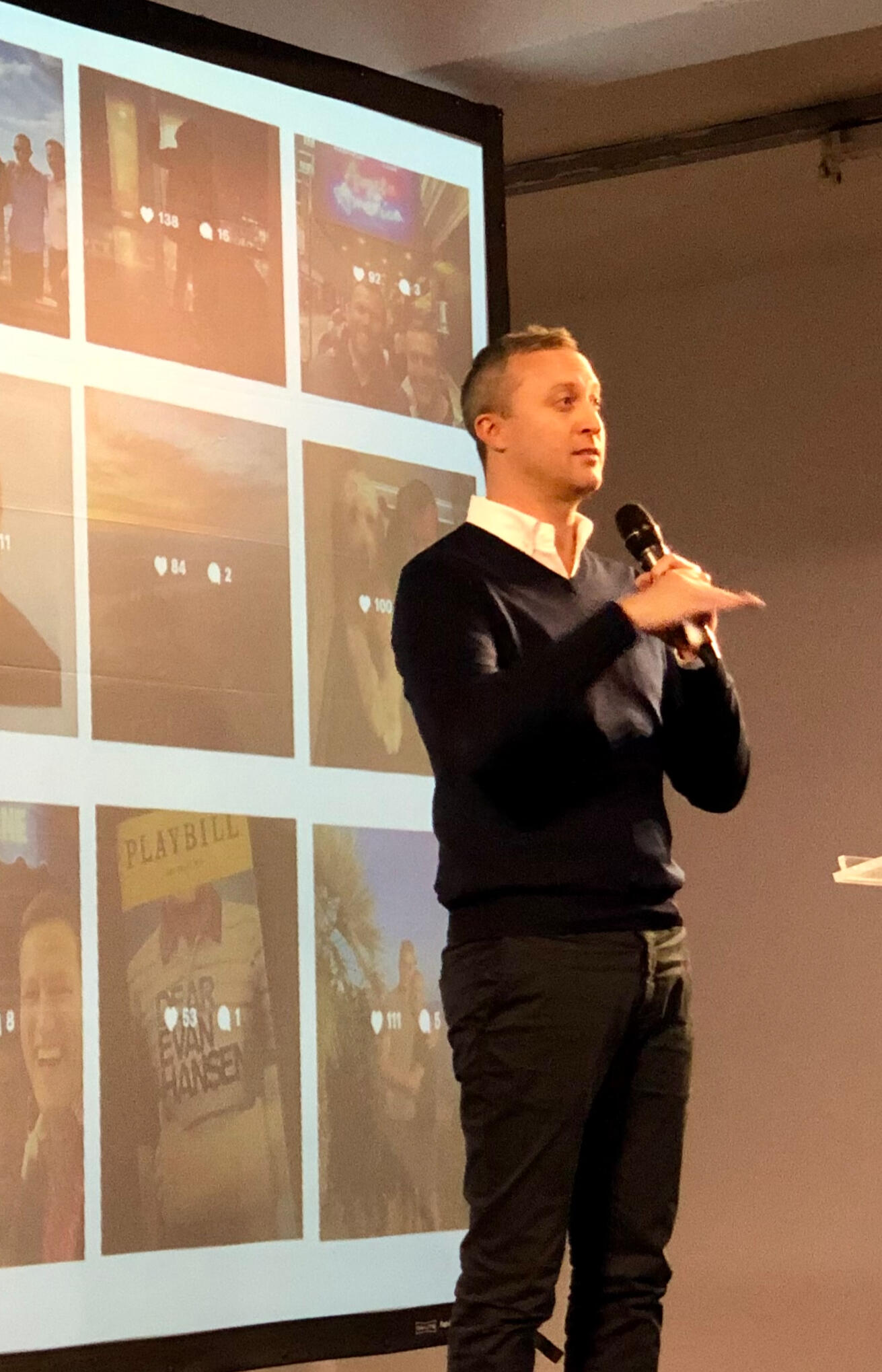 Andrew speaking on stage